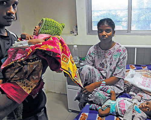 Pitiable condition: Children suffering from malnourishment and other illnesses are  undergoing treatment at the Bowring Hospital. dh photo