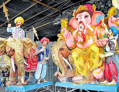 A 16-foot tall Rajasthani style Ganesha idol, costing Rs 2 lakh, on display on RV Road. DH Photo
