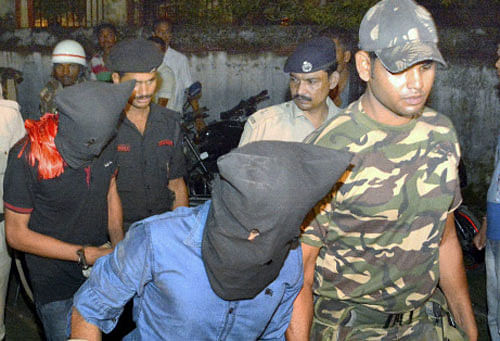 Yasin Bhatkal, the Indian Mujahideen mastermind and a key suspect in several terror blasts since 2008, is produced in a court along with an aide in Motihari on Thursday. Bhatkal was arrested in a joint operation by the central intelligence agencies and the Bihar Police from India-Nepal border. PTI Photo