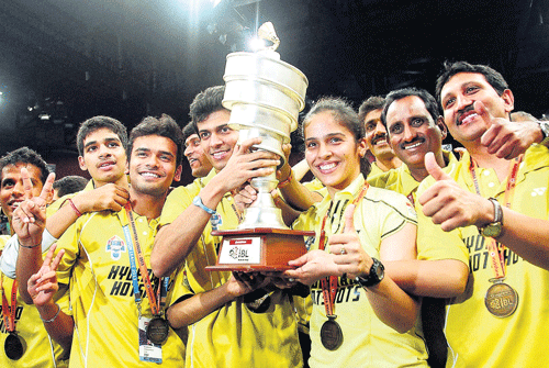 jubilant: Hyderabad Hotshots pose with their spoils after defeating Awadhe Warriors in IBL&#8200;final on Saturday. PTI