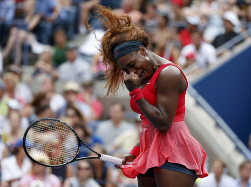 Serena Williams of the U.S. reacts after winning a point against compatriot Sloane Stephens at the U.S. Open tennis championships in New York September 1, 2013. REUTERS