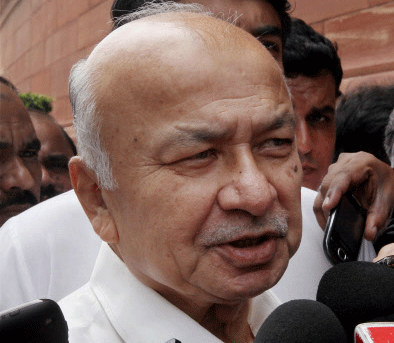 Union Home Minister Sushilkumar Shinde speaks to media at Parliament House in New Delhi on Thursday during ongoing monsoon session. PTI Photo