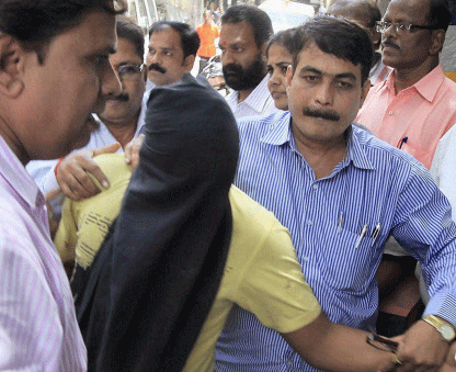 Mumbai gang rape accused Qasim Bengali is produced at the Esplanade court in Mumbai on Friday. PTI Photo