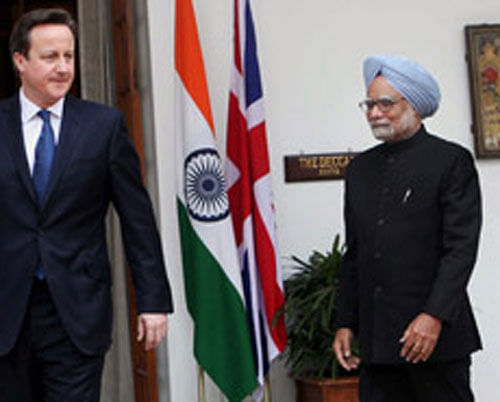 David Cameron with Manmohan Singh. PTI File
