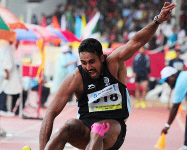 Triple Jump Silver medalist Renjith Maheswary jumps to a silver during the Asian Athletics Championships in Pune on Sunday. PTI Photo