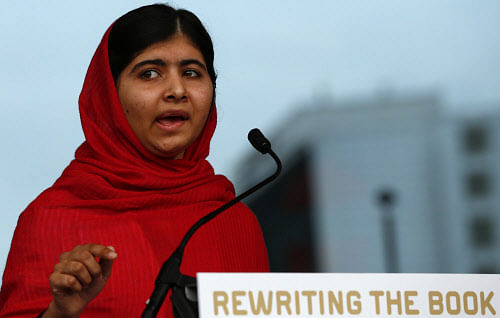 Malala Yousafzai, the Pakistani girl who was shot in the head by the Taliban for advocating girls' education, speaks at the opening of Birmingham Library in central England September 3, 2013. REUTERS