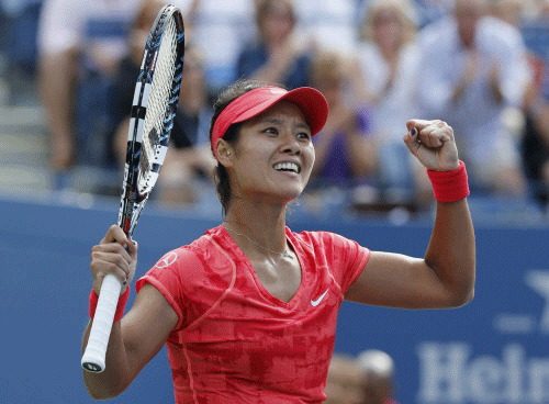 Li Na of China celebrates after defeating Ekaterina Makarova of Russia at the U.S. Open tennis championships in New York September 3, 2013. REUTERS