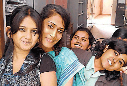 cheerful Anushree (second from left) with her students.