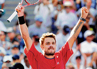red hot: Stanislas Wawrinka celebrates after his win over Andy Murray. AFP