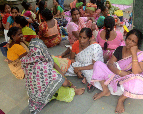 Women caretakers of the babies admitted at B C Roy Child Hospital, outside a ward of the hospital in Kolkata on Saturday. PTI Photo
