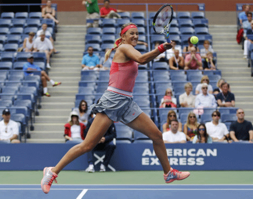 Victoria Azarenka, of Belarus, returns a shot to Victoria Azarenka, of Belarus, during the quarterfinals of the 2013 U.S. Open tennis tournament, Tuesday, Sept. 3, 2013, in New York. AP Photo