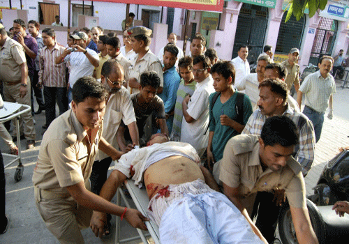 An injured of clashes being rushed to a hospital in Muzaffarnagar on Saturday. PTI Photo