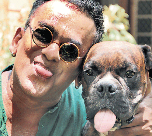 rocking Remo Fernandes with his dog.