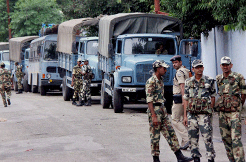 CRPF personnel deployed during curfew in Muzaffarnagar on Sunday. PTI Photo