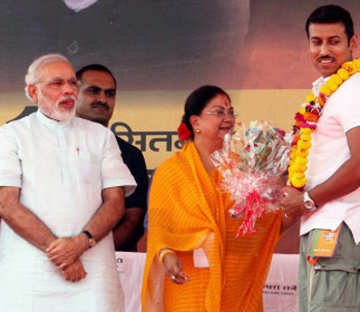 Olympic hero Rathore joins BJP, takes VRS from Army