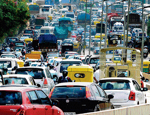 Heavy traffic chokes the KR Puram flyover. DH Photo