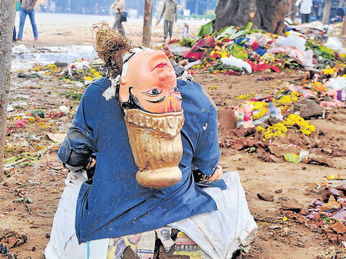 The leftover: An idol of Gowri in a broken state after immersion in the Ulsoor lake on  Thursday.&#8200;DH Photo