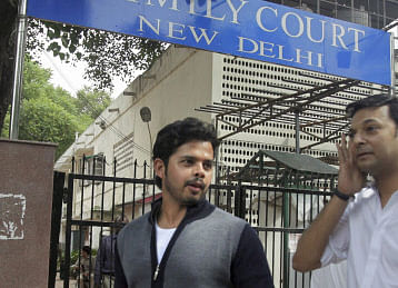 Cricketer S Sreesanth leaves after appearing in Patiala House court in New Delhi on Monday in connection with IPL fixing case. PTI Photo