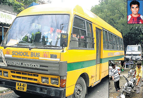 The school bus that collied with a bike at Mudalapalya junction killing a student, Ravi Kumar (inset) in Bangalore on Friday. DH Photo