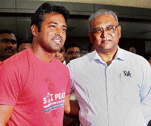 Leander Paes with his father Vece Paes on arrival in Mumbai on Thursday. PTI