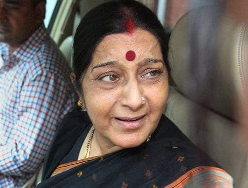 BJP leader Sushma Swaraj leaves after a meeting with the senior leader L K Advani at his residence in New Delhi on Saturday. PTI Photo