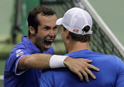 Czech Stepanek celebrates with his team mate Berdych after defeating Argentina's Zeballos and Berlocq during their Davis Cup semi-final doubles match in Prague. Reuters