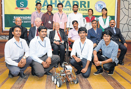 The team 'Dreamers' of Sahyadri College of Engineering and Management, Mangalore, alongwith Management and staff members display the rover like vehicle which they developed.