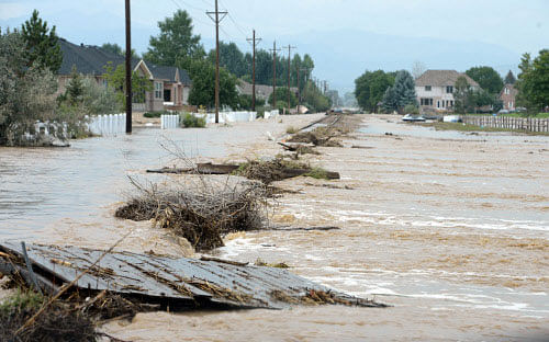 Railroad tracks running North and South at 9th Street, East of Airport Road, continue to be flooded in Longmont, Colo, on Saturday Sept. 14, 2013. AP Photo