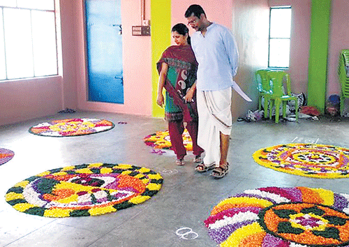 floral delight: Pookalam is an integral part of Onam.