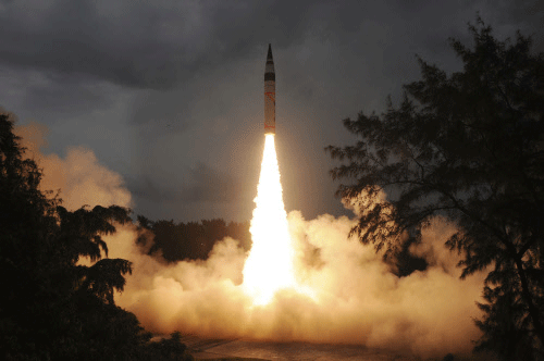 A surface-to-surface Agni-V missile is launched from the Wheeler Island off the eastern Indian state of Odisha September 15, 2013. India successfully test-fired for a second time a nuclear-capable missile on Sunday that can reach Beijing and much of Europe, bringing a step closer production of a weapon designed to strengthen its nuclear deterrent. REUTERS