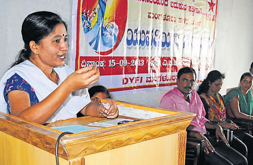 Writer Dr H S Anupama speaks at youth (female) convention, at a programme organised by DYFI in Mangalore, on Sunday. DH photo