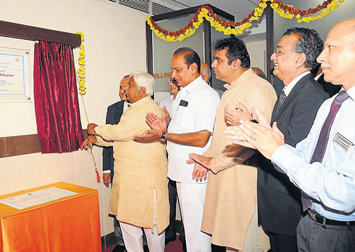 Rural Development and Panchayat Raj Minister H K Patil inaugurates a 1.5 tela magnet strength MRI machine at Kasturba Hospital in Manipal, on Monday. dh photo