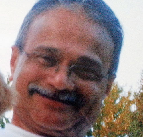 This photo provided by the family of Vishnu Pandit shows the 61-year-old man from North Potomac, Md., who was one of the 12 victims killed in the shooting rampage at the Washington Navy Yard on Monday, Sept. 16, 2013. (AP Photo/