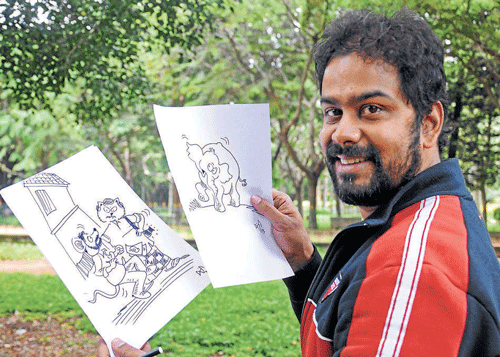 different strokes Cartoonist Ananth Shankar with his works. DH Photo