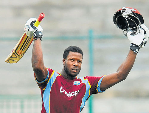 Kirk Edwards of West Indies 'A' celebrates after reaching his 100 on Thursday. DH photo