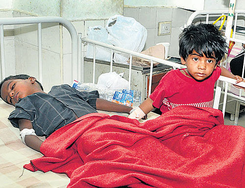 Recuperating: Children from a slum in Frazer Town undergoing treatment at Bowring  Hospital on Thursday after they ate left over prasad at a Ganesh pandal. DH photo