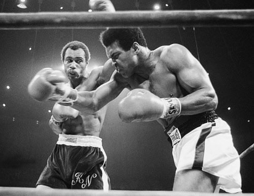 FILE - In this Sept. 10, 1973, file photo, Muhammad Ali, right, winces as Ken Norton hits him with a left to the head during their re-match at the Forum in Inglewood, Calif. Norton, a former heavyweight champion, has died, his son said, Wednesday, Sept. 18, 2013. He was 70. AP photo