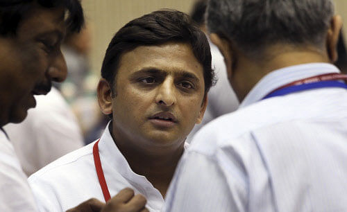 Uttar Pradesh State Chief Minister Akhilesh Yadav speaks to officials during the 16th National Integration Council meeting, in New Delhi, Monday, Sept. 23, 2013. The purpose of the National Integration Council is to find ways to counter problems that were dividing the country, including attachment to specific communities, castes, regions and languages, review national integration issues and make recommendations. (AP Photo/