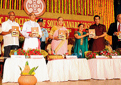 Rajasthan Governor Margaret Alva releases a book entitled 'CASK and fellow centurions' in Mangalore on Sunday. Bishop Rev Dr Aloysius Paul D'Souza and Union MInister Oscar Fernandes among others are also seen. DH photo