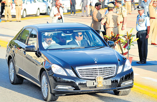 elite ride: President Pranab Mukherjee leaves for Raj Bhavan in the new bulletproof car  after his arrival in Bangalore on Monday. dh photo