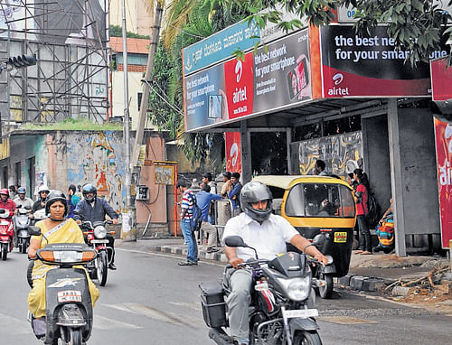 Time to shift: BMTC bus stops situated close to traffic signals are causing inconvenience to commuters and motorists alike.