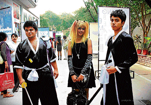 different Young boys and a girl themselves as characters of a comic book.