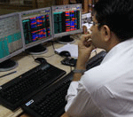 Volatile Sensex ends 64 pts lower ahead of derivatives expiry