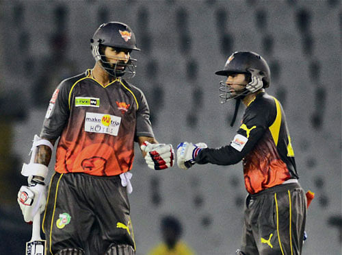 Shikhar Dhawan and Parthiv Patel of Sunrisers Hyderabad during their Champions League T20 qualifying group match against Kandurata Maroons in Mohali on Tuesday. PTI Photo