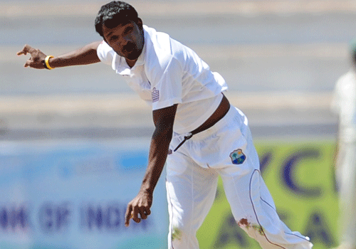 West Indies A team bowler Permaul Veerasammy in action. DH Photo/ Satish Badiger