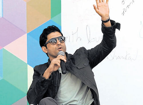Actor Farhan Akhtar reacts to a query on the inaugural day  of the Bangalore Literature Festival on Friday. dh photo