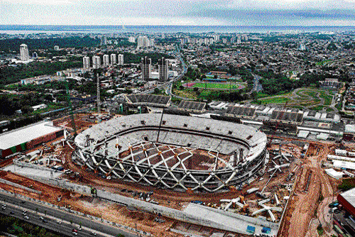 amidst trouble: Arena Amazonia, a stadium being built for the 2014 World Cup, under construction in Manaus, Brazil. NYT