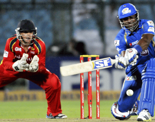 Mumbai Indians batsman Dwayne Smith plays a shot against Highveld Lions during their Champions League Twenty 20 cricket match in Jaipur on Friday. PTI Photo