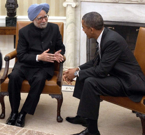 Prime Minister Manmohan Singh talks with US President Barack Obama during their media statements in White House in Washington. PTI Photo
