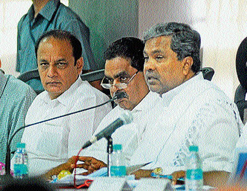 Chief Minister Siddharamaiah Charing a meeting convened to review various development works in Mangalore on Sunday. Ministers Ramanath Rai, U&#8200;T&#8200;Khader, Vinay Kumar Sorake, District-in-Charge Secretary Bharat Lal Meena and Regional Commissioner Jayanthi look on. DH photo